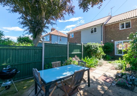 Barbecue and dine alfresco in the beautifully planted courtyard