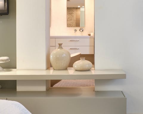 The open design of the master bathroom