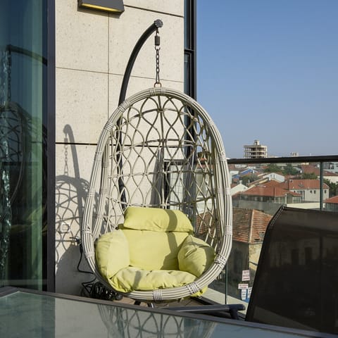 The rattan hanging chair on the terrace