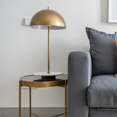 The golden industrial lamp in the living room