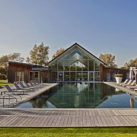 Relax by the shared outdoor swimming pool