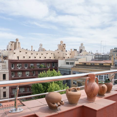 Sunbathe on the large balcony with unbeatable views of Gaudí 's masterpiece