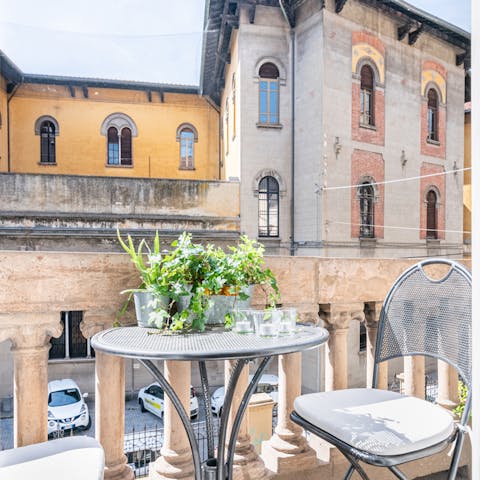 Enjoy a glass of Tuscan wine on your private balcony