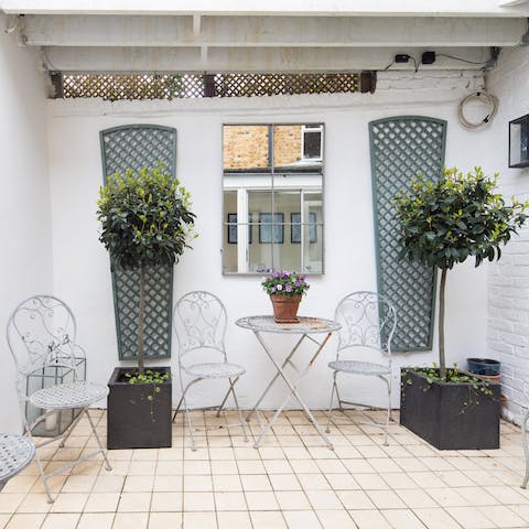 Enjoy some peace and quiet in your courtyard with a cup of tea or glass of wine
