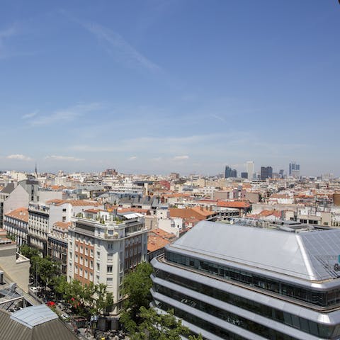 Admire the gorgeous view of Madrid's skyline from the big windows