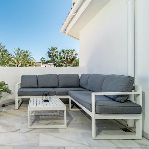 Soak up the sunshine from the comfort of the private balcony