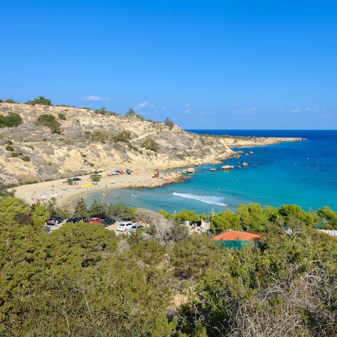 Take the short drive to the famous Konnos Beach and relax on the golden sands