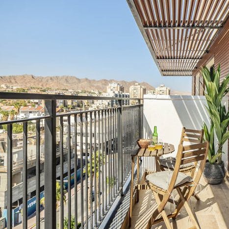 Take in the views over Eilat and the Edom mountains from your private balcony