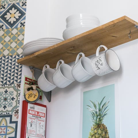 The adorable hanging cups in the kitchen 