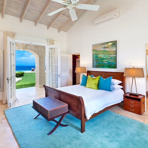 Drink in the sublime views of the Caribbean Sea from every room