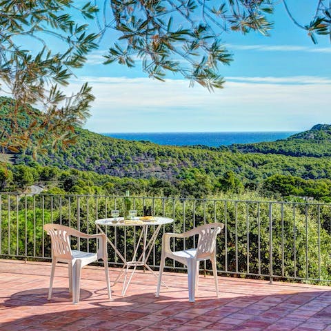 Enjoy incredible sunset views with refreshing drinks on the terrace