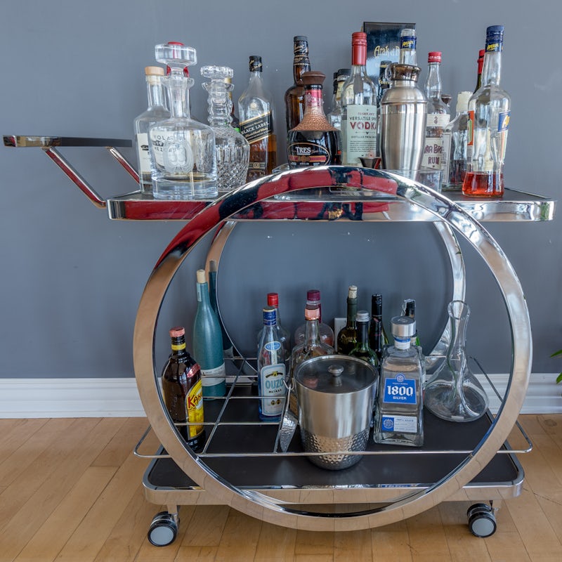 Mix up a few drinks on the well-stocked bar cart