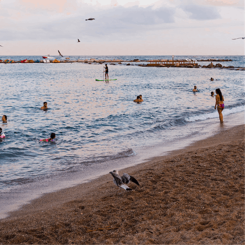 Head to one of the nearby beaches –  it's around fifteen minutes to Platja del Forum on foot 