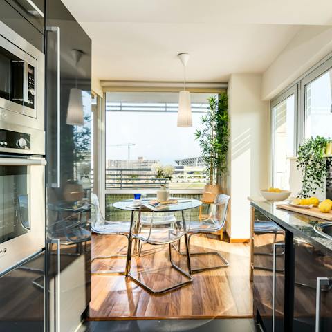 Dine in style in front of floor-to-ceiling windows