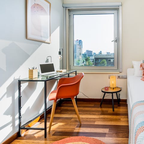 Get some work done at the desk in the pretty second bedroom