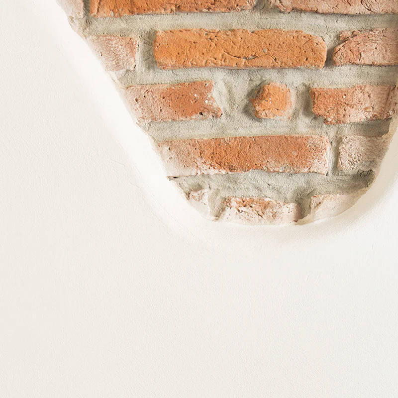 Admire decor touches like exposed brickwork