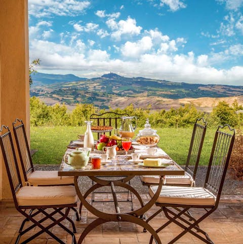 Dine outside and gaze across the Tuscan countryside