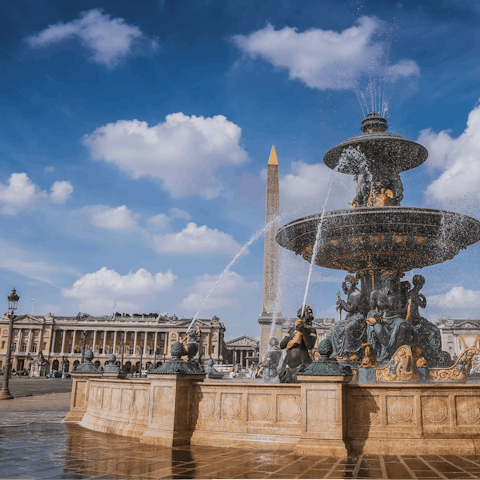 Listen to the sound of the fountains at the Place de la Concorde, a twenty-minute stroll from this home