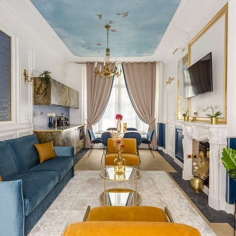 Relax in the elegant living area with a glass of Champagne after a day of touring the city