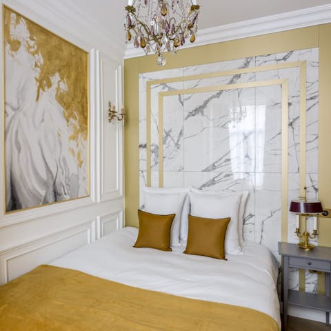 Get some rest in the elegant bedrooms after visiting Galeries Lafayettes 
