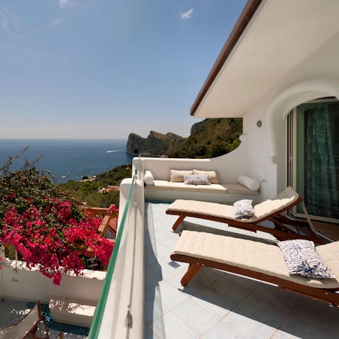 Soak up the sun and sea views from the private balcony