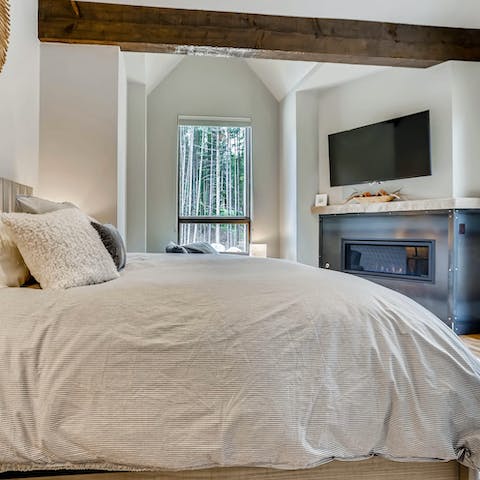Enjoy the master bedroom's fireplace