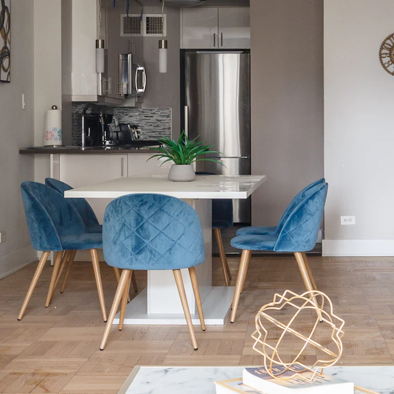 The blue velvet dining chairs