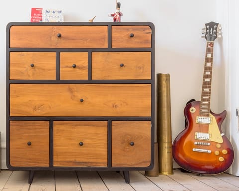 Vintage-style furniture and an electric guitar
