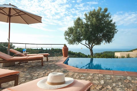 Paddle about gracefully in the infinity swimming pool with glorious views of the Aegean Sea