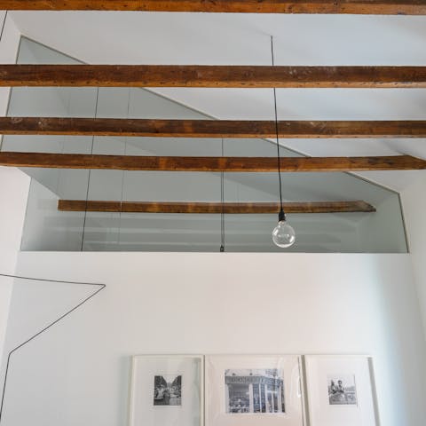 Admire stylish, original features such as the exposed beams in the ceiling
