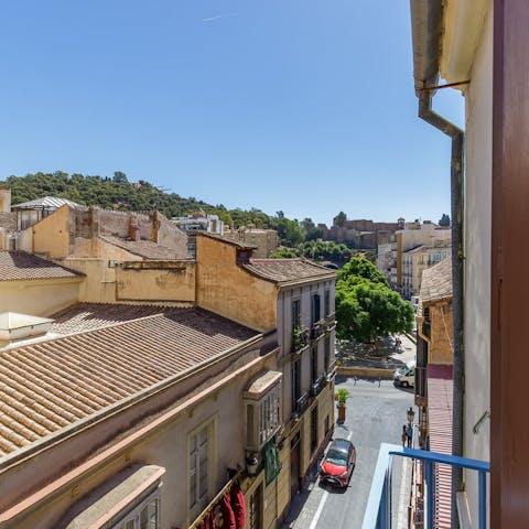 Enjoy street and hill views from the Juliette balcony