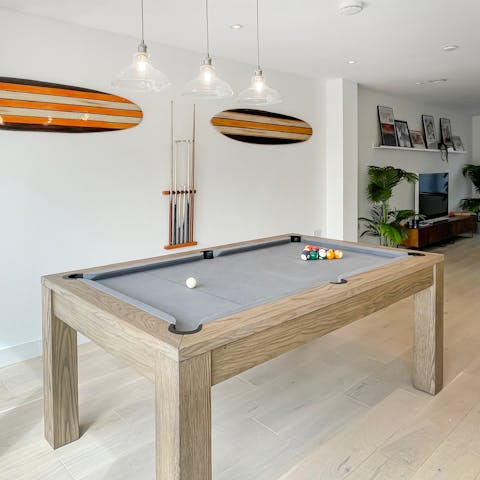 Unleash your competitive side with a game of pool