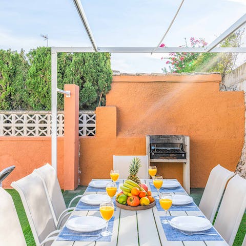 Serve up Pineapple Mimosa's at the alfresco dining area