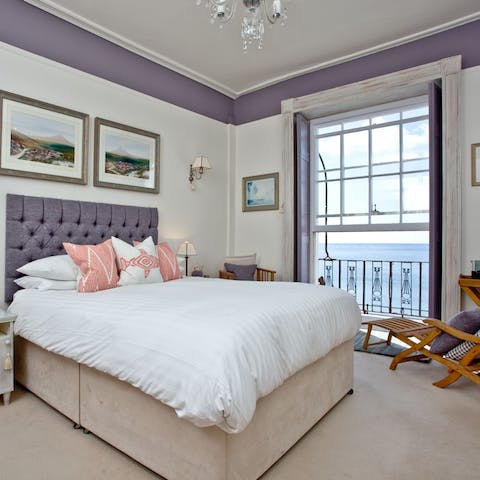 Wake up to glorious sea views from your soothing bedroom