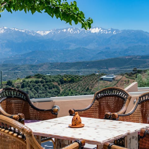 Gather for sunset cocktails and card games at one of the outdoor tables