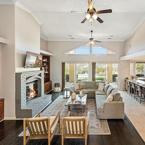 Gather the group together around the fireplace in the living room