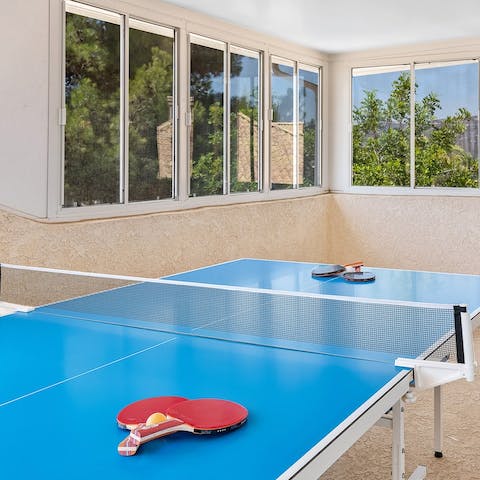 Get competitive in the games room and start a ping-pong tournament