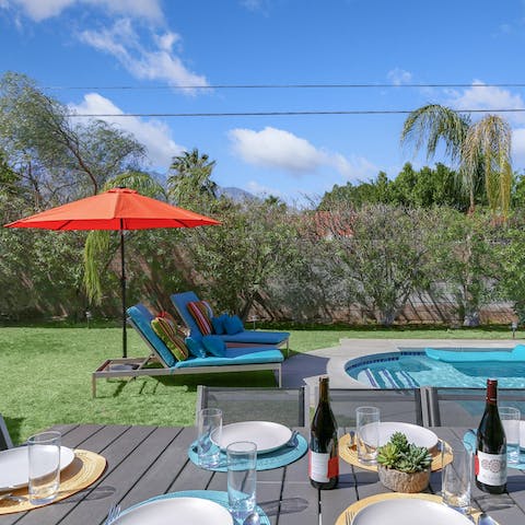 Spend sunny days poolside with food, good wine and lots of sunscreen