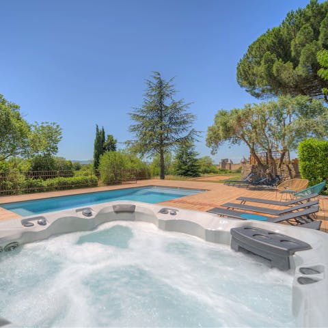 Flit between the pool and Jacuzzi – both with castle views