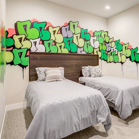 Admire the graffiti art in the bedroom