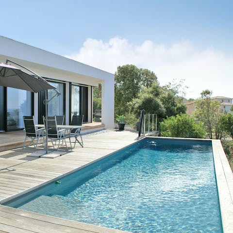 Cool off from the Corsican sun in the infinity pool