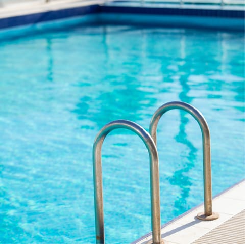 Cool off in the shared swimming pool after a day of exploring 