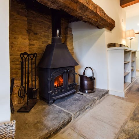 Spend evenings relaxing by the wood burning stove