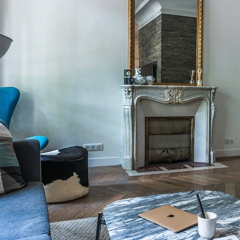 Herringbone parquet & intricate fireplace