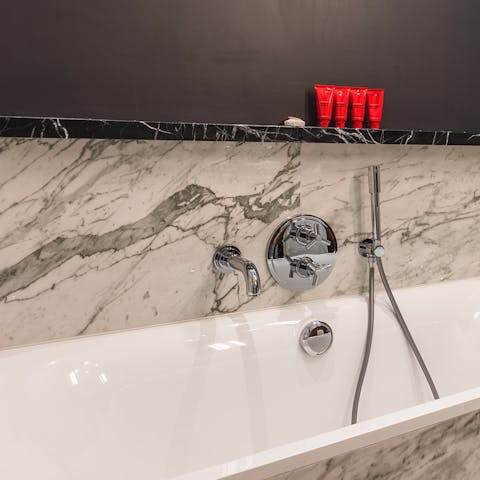 Spotless modern bathroom with high-end toiletries