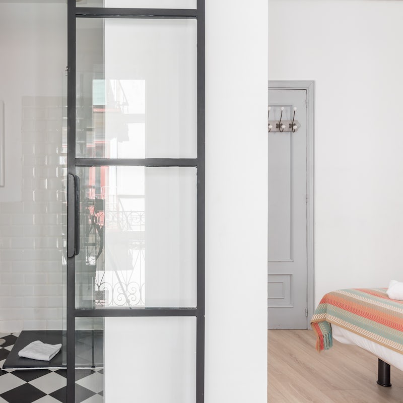 These glass shoji doors in the master bedroom