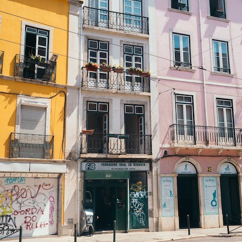 Explore Bairro Alto's cobbled streets, a ten-minute walk away