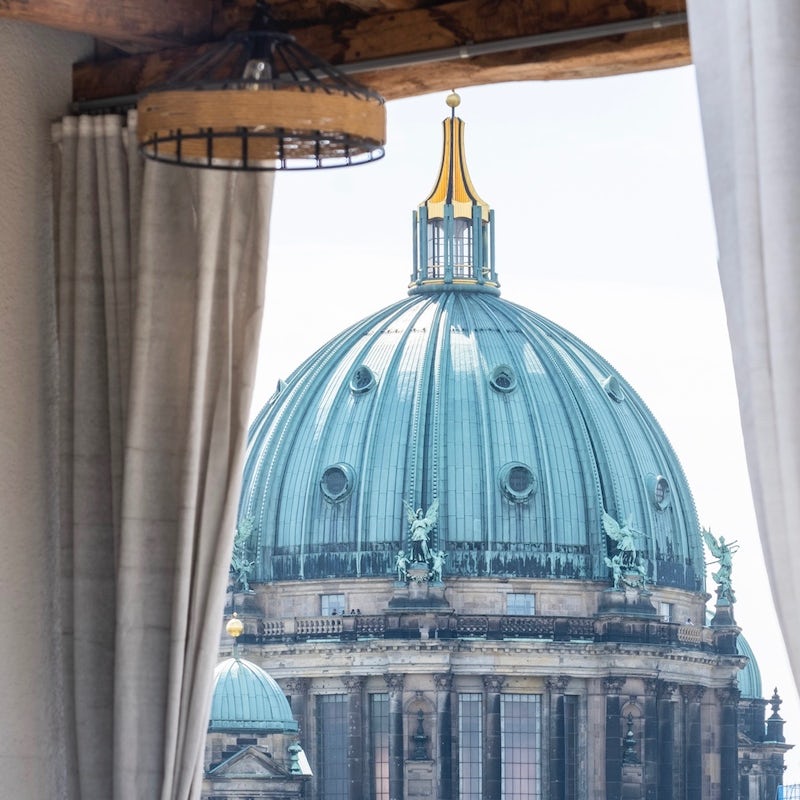 Enjoy stunning views of Berliner Dom from your rooftop cabana