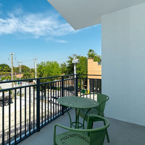 Sit outside in the fresh, warm air on the private balcony