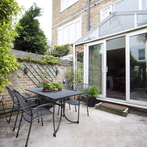Serve up a light dinner out on the alfresco dining area in the garden